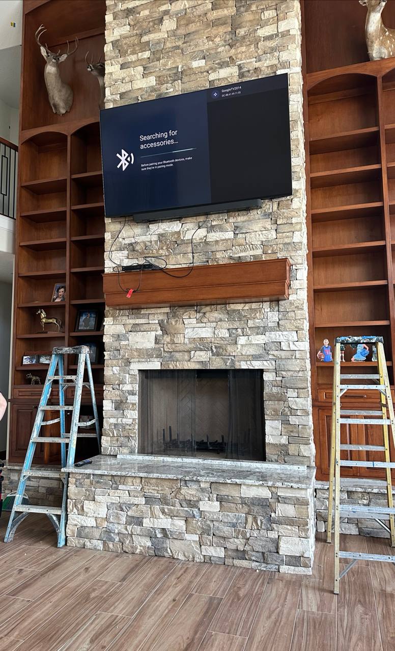 TV mounted above fireplace with concealed wires, Houston TX #6